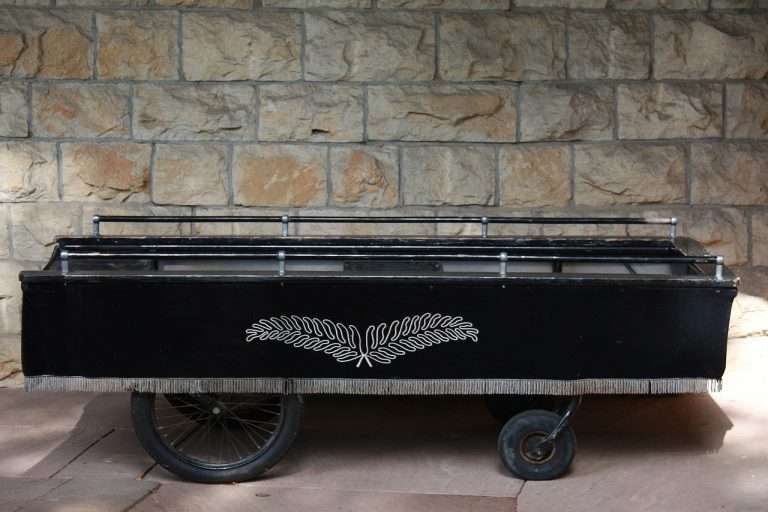 stretcher, hearse, coffin